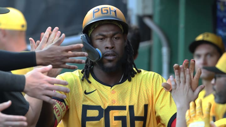 Pittsburgh, Pennsylvania, USA; Pittsburgh Pirates center fielder Oneil Cruz (15) celebrates his solo home run in the dugout against the Cleveland Guardians during the first inning at PNC Park.