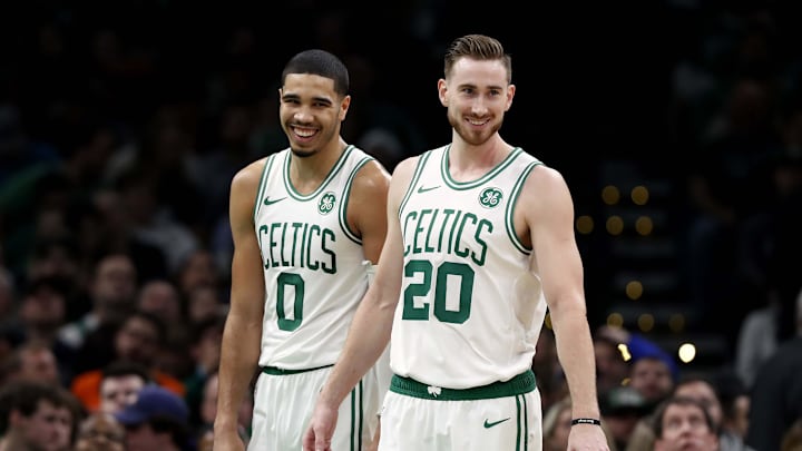 Dec 14, 2018; Boston, MA, USA; Boston Celtics forward Gordon Hayward (20) and forward Jayson Tatum (0) share a laugh during the second half of Boston's 129-108 win over the Atlanta Hawks at TD Garden. Mandatory Credit: Winslow Townson-Imagn Images