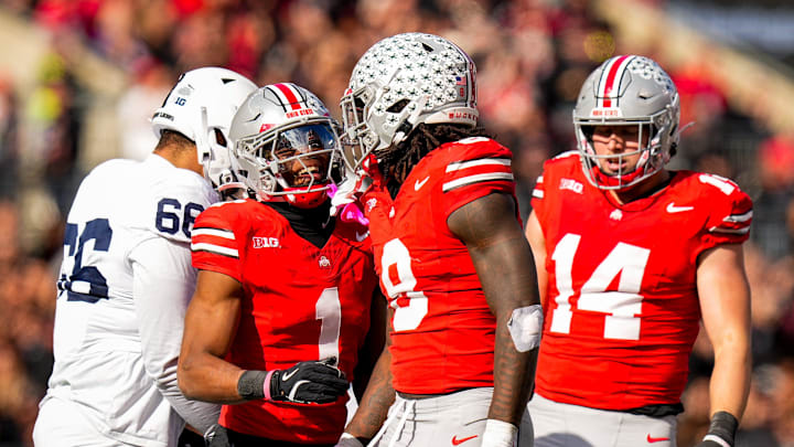 Ohio State Buckeyes cornerback Davison Igbinosun (1) and linebacker Arvell Reese (8) celebrate after Reese sacked the quarterback in the second half of the college football game at Ohio Stadium on Saturday, Nov. 1, 2025 in Columbus, Ohio.