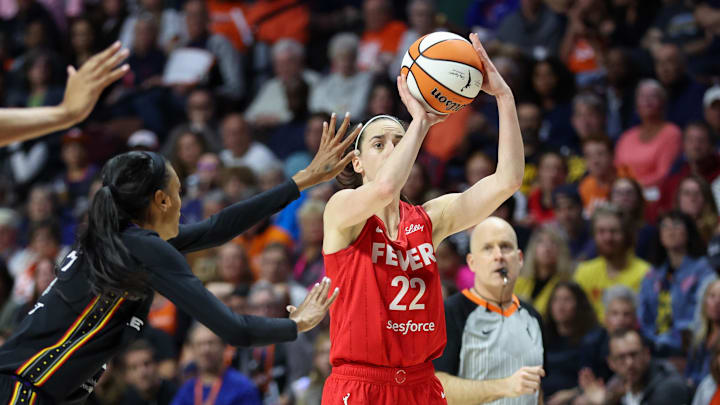 Sep 25, 2024; Uncasville, Connecticut, USA; Indiana Fever guard Caitlin Clark (22) shoots during the first half against the Connecticut Sun during game two of the first round of the 2024 WNBA Playoffs at Mohegan Sun Arena. Mandatory Credit: Paul Rutherford-Imagn Images