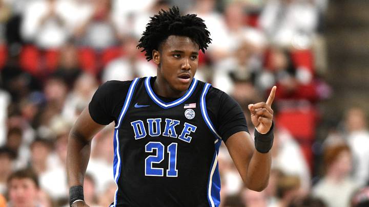 Mar 2, 2026; Raleigh, North Carolina, USA; Duke Blue Devils center Patrick Ngongba II (21) reacts after scoring against the NC State Wolfpack during the first half at Lenovo Center. Mar 2, 2026; Raleigh, North Carolina, USA; Duke Blue Devils center Patrick Ngongba II (21) reacts after scoring against the NC State Wolfpack during the first half at Lenovo Center.