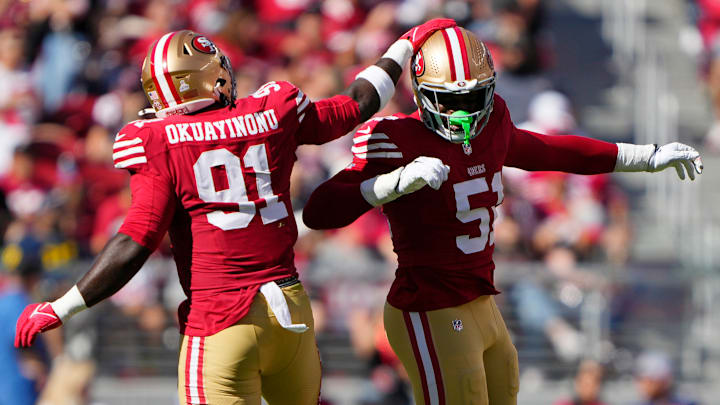 San Francisco 49ers defensive lineman Sam Okuayinonu (L) and defensive end Robert Beal Jr. (R)