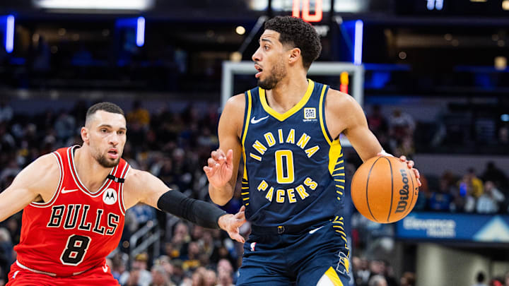 Jan 8, 2025; Indianapolis, Indiana, USA; Indiana Pacers guard Tyrese Haliburton (0) dribbles the ball while Chicago Bulls guard Zach LaVine (8) defends in the second half at Gainbridge Fieldhouse. Mandatory Credit: Trevor Ruszkowski-Imagn Images Jan 8, 2025; Indianapolis, Indiana, USA; Indiana Pacers guard Tyrese Haliburton (0) dribbles the ball while Chicago Bulls guard Zach LaVine (8) defends in the second half at Gainbridge Fieldhouse. Mandatory Credit: Trevor Ruszkowski-Imagn Images