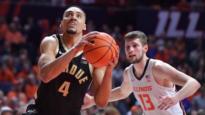 Purdue Boilermakers forward Trey Kaufman-Renn (4) drives the ball 