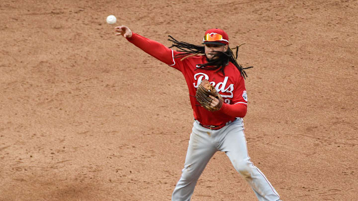 Sep 27, 2020; Minneapolis, Minnesota, USA; Cincinnati Reds shortstop Freddy Galvis (3) turns the second half of a double play off the bat of Minnesota Twins designated hitter Nelson Cruz (23) during the eighth inning at Target Field. Mandatory Credit: Jeffrey Becker-Imagn Images Sep 27, 2020; Minneapolis, Minnesota, USA; Cincinnati Reds shortstop Freddy Galvis (3) turns the second half of a double play off the bat of Minnesota Twins designated hitter Nelson Cruz (23) during the eighth inning at Target Field. Mandatory Credit: Jeffrey Becker-Imagn Images