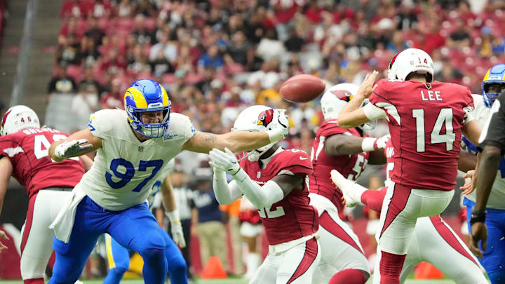Sep 25, 2022; Glendale, Ariz., U.S.; Los Angeles Rams defensive tackle Michael Hoecht (97) blocks a punt by Arizona Cardinals punter Andy Lee (14) during the first quarter at State Farm Stadium. Mandatory Credit: Michael Chow-Arizona Republic

Nfl Rams At Cardinals

Syndication Arizona Republic