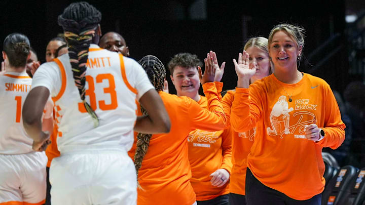 Tennessee Lady Vols head coach Kim Caldwell high-fives Tennessee guard Samara Spencer (7) before a women's college basketball game between the Lady Vols and Mississippi State at Thompson-Boling Arena at Food City Center on Thursday, Jan. 16, 2025.