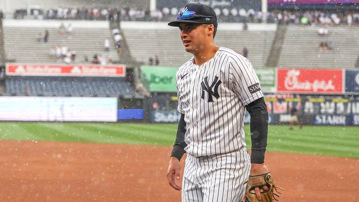 Jun 7, 2026; Bronx, New York, USA;  New York Yankees shortstop Anthony Volpe (11) goes into the dugout during a rain delay against the Boston Red Sox at Yankee Stadium. Mandatory Credit: Wendell Cruz-Imagn Images