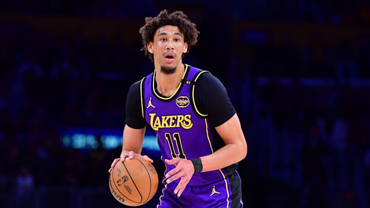 Feb 6, 2025; Los Angeles, California, USA;  Los Angeles Lakers center Jaxson Hayes (11) controls the ball against the against the Golden State Warriors during the first half at Crypto.com Arena. Mandatory Credit: Gary A. Vasquez-Imagn Images