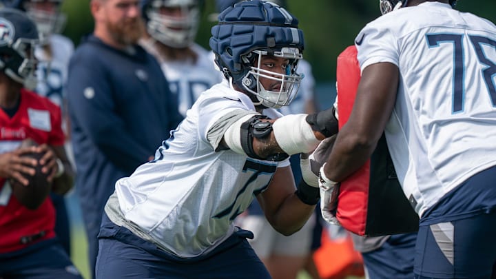 Offensive lineman Jamarco Jones (73) lines up against Nicholas Petit-Frere (78) at the Tennessee Titans practice facility, Ascension St. Thomas Sports Park, Wednesday, July 26, 2023.