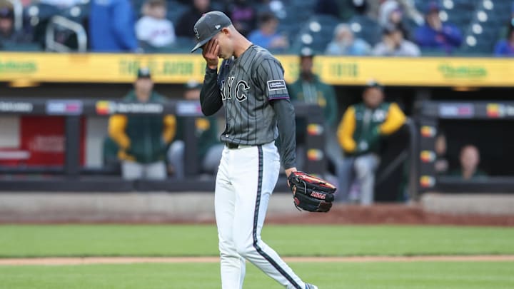 Apr 11, 2026; New York City, New York, USA;  New York Mets relief pitcher Luke Weaver (30) walks off the mound after giving up four runs in the eighth inning against the Athletics at Citi Field. Mandatory Credit: Wendell Cruz-Imagn Images