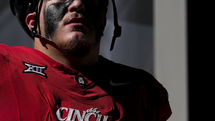 Oct 11, 2025; Cincinnati, Ohio, USA; The Cincinnati logo is seen on a player’s jersey before the game between the UCF Knights and the Cincinnati Bearcats at Nippert Stadium. Mandatory Credit: Aaron Doster-Imagn Images Oct 11, 2025; Cincinnati, Ohio, USA; The Cincinnati logo is seen on a player’s jersey before the game between the UCF Knights and the Cincinnati Bearcats at Nippert Stadium. Mandatory Credit: Aaron Doster-Imagn Images