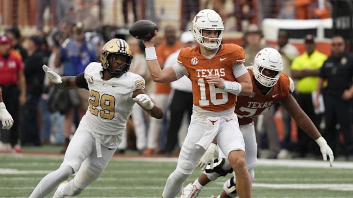 Nov 1, 2025; Austin, Texas, USA; Texas Longhorns quarterback Arch Manning (16) passes ahead of Vanderbilt Commodores defensive back Thomas Jones (9) during the second half at Darrell K Royal-Texas Memorial Stadium. Mandatory Credit: Scott Wachter-Imagn Images