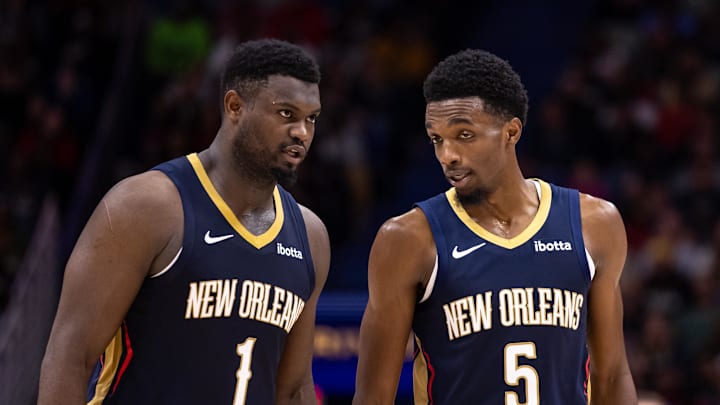 Nov 22, 2023; New Orleans, Louisiana, USA; New Orleans Pelicans forward Zion Williamson (1) talks with forward Herbert Jones (5) against the Sacramento Kings during the second half at the Smoothie King Center. 
