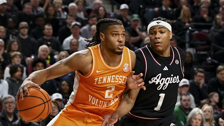 Feb 22, 2025; College Station, Texas, USA; Tennessee Volunteers guard Chaz Lanier (2) drives to the basket as Texas A&M Aggies guard Zhuric Phelps (1) defends during the second half at Reed Arena. Mandatory Credit: Maria Lysaker-Imagn Images 