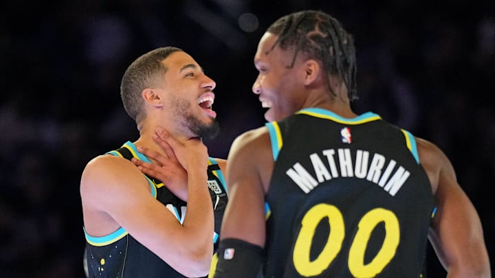 Feb 17, 2024; Indianapolis, IN, USA; Indiana Pacers guard Bennedict Mathurin (00) and guard Tyrese Haliburton (0) react after competing in the skills challenge during NBA All Star Saturday Night at Lucas Oil Stadium. Mandatory Credit: Kyle Terada-Imagn Images