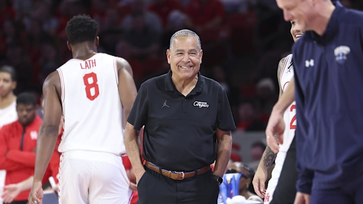 Dec 13, 2025; Houston, Texas, USA; Houston Cougars head coach Kelvin Sampson smiles during the first half against the New Orleans Privateers at Fertitta Center. Mandatory Credit: Troy Taormina-Imagn Images Dec 13, 2025; Houston, Texas, USA; Houston Cougars head coach Kelvin Sampson smiles during the first half against the New Orleans Privateers at Fertitta Center. Mandatory Credit: Troy Taormina-Imagn Images
