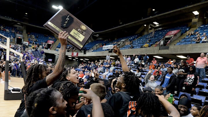 Manual players and fans celebrate their win over Williamsville during the Class 2A Springfield Supersectionals at the BOS Center Monday, March 10, 2025.