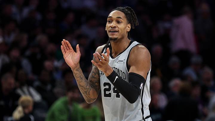 Nov 30, 2025; Minneapolis, Minnesota, USA; San Antonio Spurs guard Devin Vassell (24) reacts during the first half against the Minnesota Timberwolves at Target Center. Mandatory Credit: Matt Krohn-Imagn Images