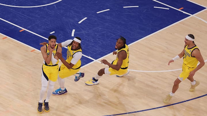 May 21, 2025; New York, New York, USA; Indiana Pacers guard Tyrese Haliburton (0) celebrates with teammates after tying the game in the fourth quarter to send the game to overtime against the New York Knicks during game one of the eastern conference finals for the 2025 NBA Playoffs at Madison Square Garden. Mandatory Credit: Brad Penner-Imagn Images May 21, 2025; New York, New York, USA; Indiana Pacers guard Tyrese Haliburton (0) celebrates with teammates after tying the game in the fourth quarter to send the game to overtime against the New York Knicks during game one of the eastern conference finals for the 2025 NBA Playoffs at Madison Square Garden. Mandatory Credit: Brad Penner-Imagn Images