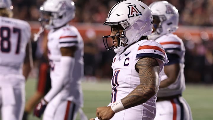 Sep 28, 2024; Salt Lake City, Utah, USA; Arizona Wildcats quarterback Noah Fifita (11) reacts to a touchdown against the Utah Utes during the fourth quarter at Rice-Eccles Stadium. Mandatory Credit: Rob Gray-Imagn Images