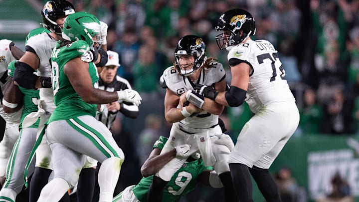 Nov 3, 2024; Philadelphia, Pennsylvania, USA; Jacksonville Jaguars quarterback Trevor Lawrence (16) is sacked by Philadelphia Eagles linebacker Josh Sweat (19) during the fourth quarter at Lincoln Financial Field. Mandatory Credit: Bill Streicher-Imagn Images Nov 3, 2024; Philadelphia, Pennsylvania, USA; Jacksonville Jaguars quarterback Trevor Lawrence (16) is sacked by Philadelphia Eagles linebacker Josh Sweat (19) during the fourth quarter at Lincoln Financial Field. Mandatory Credit: Bill Streicher-Imagn Images