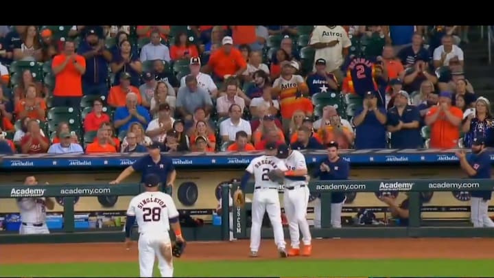 Bregman walks off the field to a standing ovation.