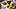 Team Maize defensive lineman Travis Moten (57), tackles Team Blue quarterback Chase Herbstreit Team Maize defensive lineman Travis Moten (57), tackles Team Blue quarterback Chase Herbstreit