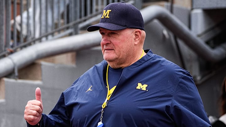 Michigan acting head coach Biff Poggi