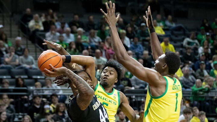 Oregon guard Jermaine Couisnard and Oregon center N'Faly Dante guard Colorado center Eddie Lampkin