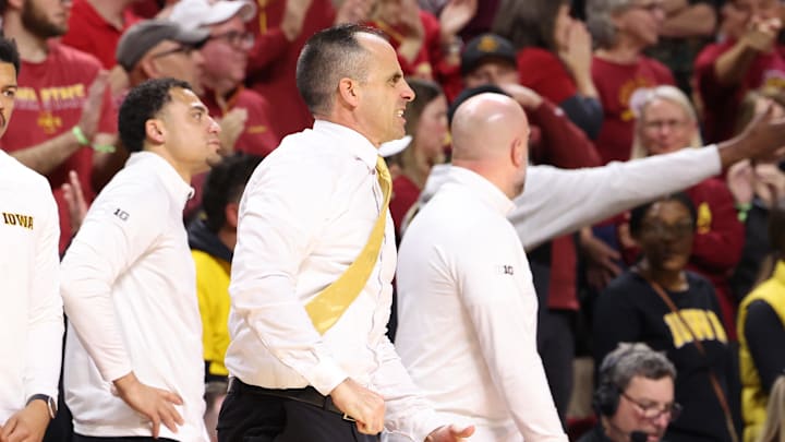 Dec 11, 2025; Ames, Iowa, USA; Iowa Hawkeyes head coach Ben McCollum watches his team play the Iowa State Cyclones during the first half at James H. Hilton Coliseum. Mandatory Credit: Reese Strickland-Imagn Images