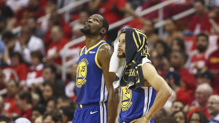 May 6, 2019; Houston, TX, USA; Golden State Warriors forward Kevin Durant (35) and guard Stephen Curry (30) look on during the third quarter against the Houston Rockets in game four of the second round of the 2019 NBA Playoffs at Toyota Center. Mandatory Credit: Troy Taormina-Imagn Images