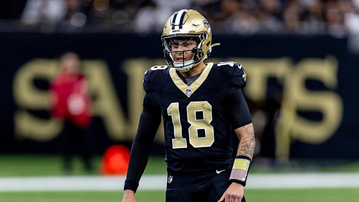 Dec 29, 2024; New Orleans, Louisiana, USA;  New Orleans Saints quarterback Spencer Rattler (18) looks on against the Las Vegas Raiders during the first half at Caesars Superdome. Mandatory Credit: Stephen Lew-Imagn Images