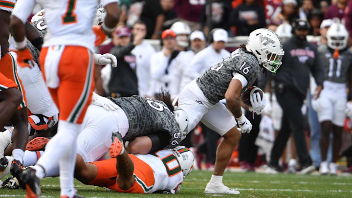 Nov 22, 2025; Blacksburg, Va.; Virginia Tech running back Jeffrey Overton (16) runs the ball against Miami.