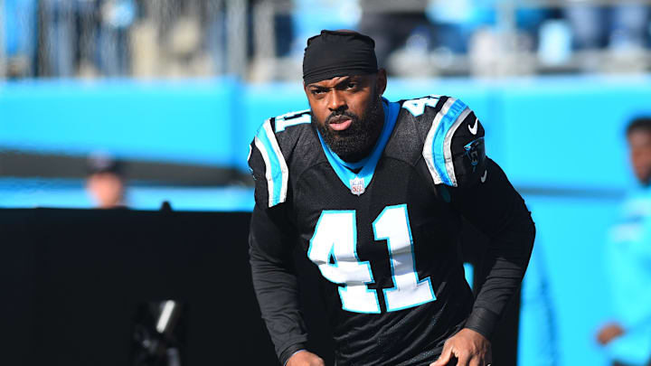 Carolina Panthers defensive back Captain Munnerlyn (41) runs on to the field before the game 
