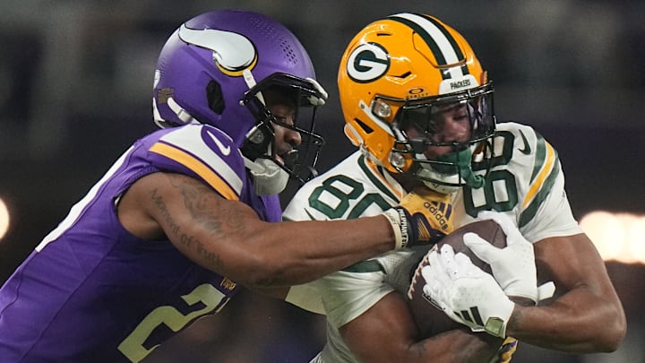 Green Bay Packers wide receiver Bo Melton makes a reception before being tackled by Akayleb Evans. The Packers and Vikings play Sunday in the first big NFC North showdown. Green Bay Packers wide receiver Bo Melton makes a reception before being tackled by Akayleb Evans. The Packers and Vikings play Sunday in the first big NFC North showdown.