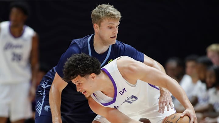 July 7, 2025; Salt Lake City, Utah, USA; Grizzlies guard Cam Spencer (24) guarding Utah guard Walter Clayton Jr. (13) during NBA Salt Lake City Summer League 