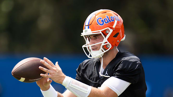 Florida Gators quarterback Graham Mertz (15) takes a snap during Fall practice at Sanders Practice Fields in Gainesville, FL on Thursday, August 1, 2024. [Doug Engle/Gainesville Sun]