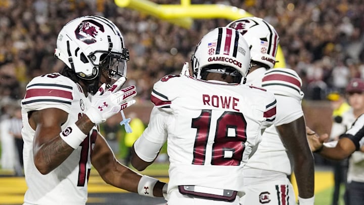 Sep 20, 2025; Columbia, Missouri, USA; South Carolina Gamecocks wide receiver Brian Rowe Jr. (18) celebrates with team mates against the Missouri Tigers after scoring during the first half of the game at Faurot Field at Memorial Stadium. Mandatory Credit: Denny Medley-Imagn Images Sep 20, 2025; Columbia, Missouri, USA; South Carolina Gamecocks wide receiver Brian Rowe Jr. (18) celebrates with team mates against the Missouri Tigers after scoring during the first half of the game at Faurot Field at Memorial Stadium. Mandatory Credit: Denny Medley-Imagn Images