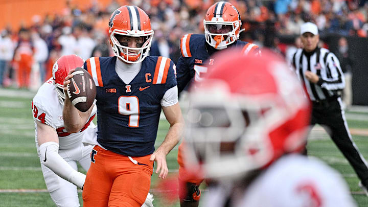 Nov 1, 2025; Champaign, Illinois, USA; Illinois Fighting Illini quarterback Luke Altmyer (9) runs with the ball during the first half against the Rutgers Scarlet Knights at Memorial Stadium. Mandatory Credit: Ron Johnson-Imagn Images Nov 1, 2025; Champaign, Illinois, USA; Illinois Fighting Illini quarterback Luke Altmyer (9) runs with the ball during the first half against the Rutgers Scarlet Knights at Memorial Stadium. Mandatory Credit: Ron Johnson-Imagn Images