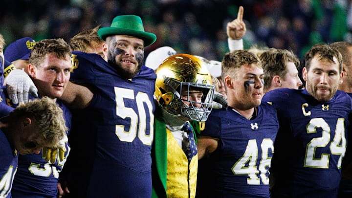 The Notre Dame Leprechaun wears offensive lineman Rocco Spindler's (50) helmet after winning a NCAA college football game 52-3 against Florida State at Notre Dame Stadium on Saturday, Nov. 9, 2024, in South Bend. The Notre Dame Leprechaun wears offensive lineman Rocco Spindler's (50) helmet after winning a NCAA college football game 52-3 against Florida State at Notre Dame Stadium on Saturday, Nov. 9, 2024, in South Bend.