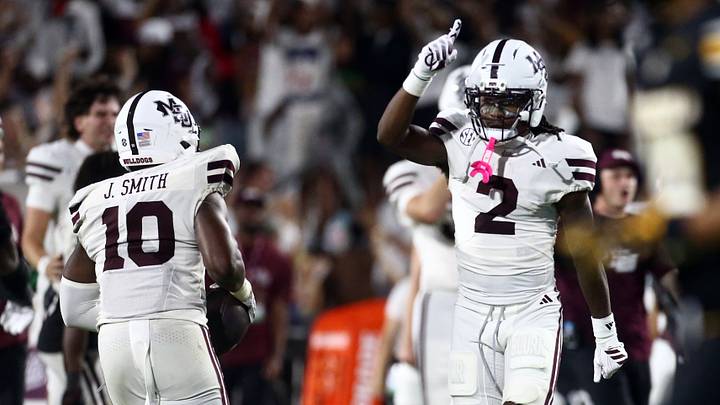 Sep 26, 2026; Starkville, Mississippi, USA; Mississippi State Bulldogs wide receiver Marquis Johnson (2) reacts with linebacker Jalen Smith (10) during the fourth quarter against the Missouri Tigers at Davis Wade Stadium at Scott Field. Mandatory Credit: Petre Thomas-Imagn Images
