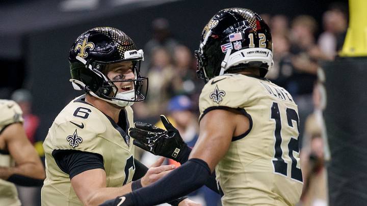 Dec 21, 2025; New Orleans, Louisiana, USA; New Orleans Saints wide receiver Chris Olave (12) celebrates a touchdown against the New York Jets with New Orleans Saints quarterback Tyler Shough (6) during the third quarter at Caesars Superdome. Mandatory Credit: Matthew Hinton-Imagn Images