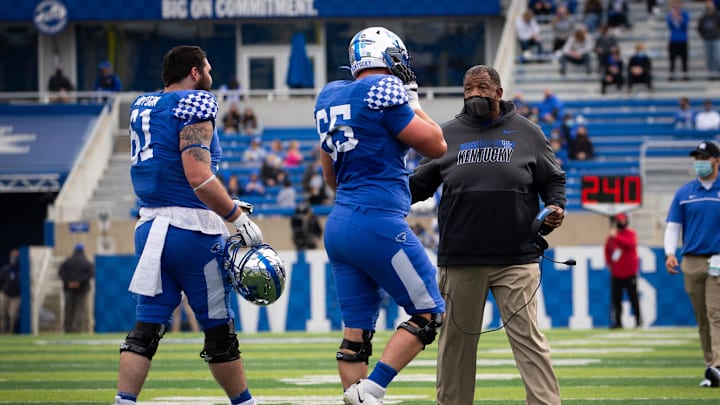 Nov 14, 2020; Lexington, Kentucky, USA; Kentucky Wildcats associate head coach Vince Marrow talks to his players during a timeout during the second quarter at Kroger Field. Mandatory Credit: Arden Barnes-Imagn Images