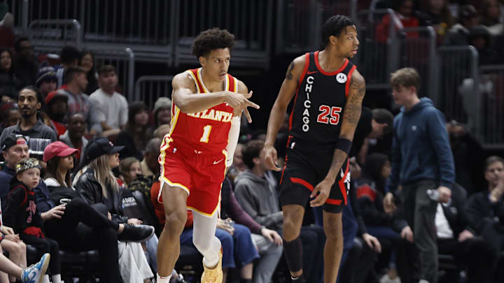 Apr 1, 2024; Chicago, Illinois, USA; Atlanta Hawks forward Jalen Johnson (1) reacts after scoring against the Chicago Bulls during the first half at United Center. Mandatory Credit: Kamil Krzaczynski-Imagn Images