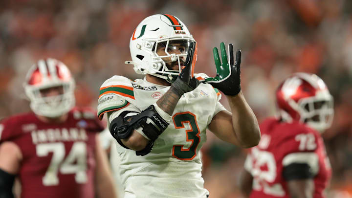 Jan 19, 2026; Miami Gardens, FL, USA; Miami Hurricanes defensive lineman Akheem Mesidor (3) celebrates after a sack against the Indiana Hoosiers in the third quarter during the College Football Playoff National Championship game at Hard Rock Stadium. Mandatory Credit: Sam Navarro-Imagn Images