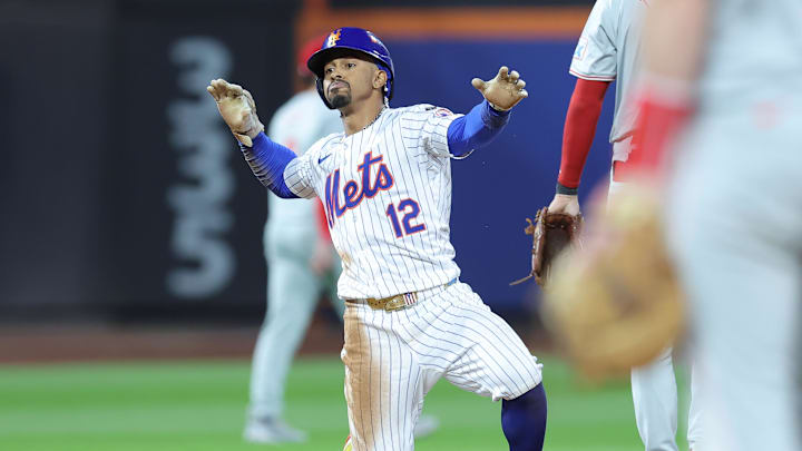 New York Mets shortstop Francisco Lindor (12) reacts at second base after hitting an RBI double against the Philadelphia Phillies in the eighth inning during game three of the NLDS for the 2024 MLB Playoffs at Citi Field on Oct 8.