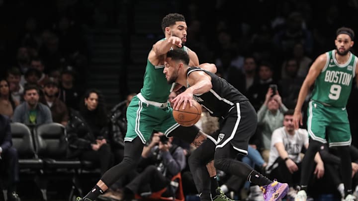 Jan 12, 2023; Brooklyn, New York, USA; Brooklyn Nets guard Ben Simmons (10) looks to post up against Boston Celtics forward Jayson Tatum (0) in the first quarter at Barclays Center. Mandatory Credit: Wendell Cruz-Imagn Images Jan 12, 2023; Brooklyn, New York, USA; Brooklyn Nets guard Ben Simmons (10) looks to post up against Boston Celtics forward Jayson Tatum (0) in the first quarter at Barclays Center. Mandatory Credit: Wendell Cruz-Imagn Images