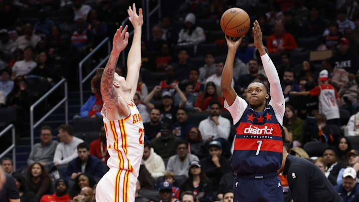 Nov 25, 2025; Washington, District of Columbia, USA; Washington Wizards guard Bub Carrington (7) shoots the ball over Atlanta Hawks guard Vit Krejci (27) in the second half at Capital One Arena. Mandatory Credit: Geoff Burke-Imagn Images Nov 25, 2025; Washington, District of Columbia, USA; Washington Wizards guard Bub Carrington (7) shoots the ball over Atlanta Hawks guard Vit Krejci (27) in the second half at Capital One Arena. Mandatory Credit: Geoff Burke-Imagn Images