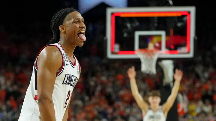 Apr 4, 2026; Indianapolis, IN, USA; UConn Huskies guard Silas Demary Jr. (2) celebrates after their win against the Illinois Fighting Illini in a semifinal of the Final Four of the men's 2026 NCAA Tournament at Lucas Oil Stadium. Mandatory Credit: Bob Donnan-Imagn Images